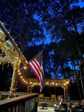 American flag billowing from our outdoor grill area.